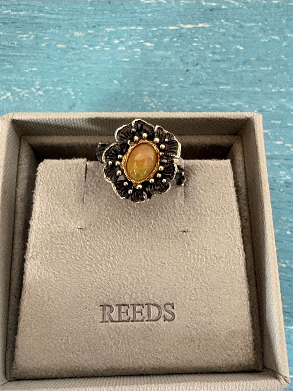 Reeds 925 blackened sterling and genuine opal ring